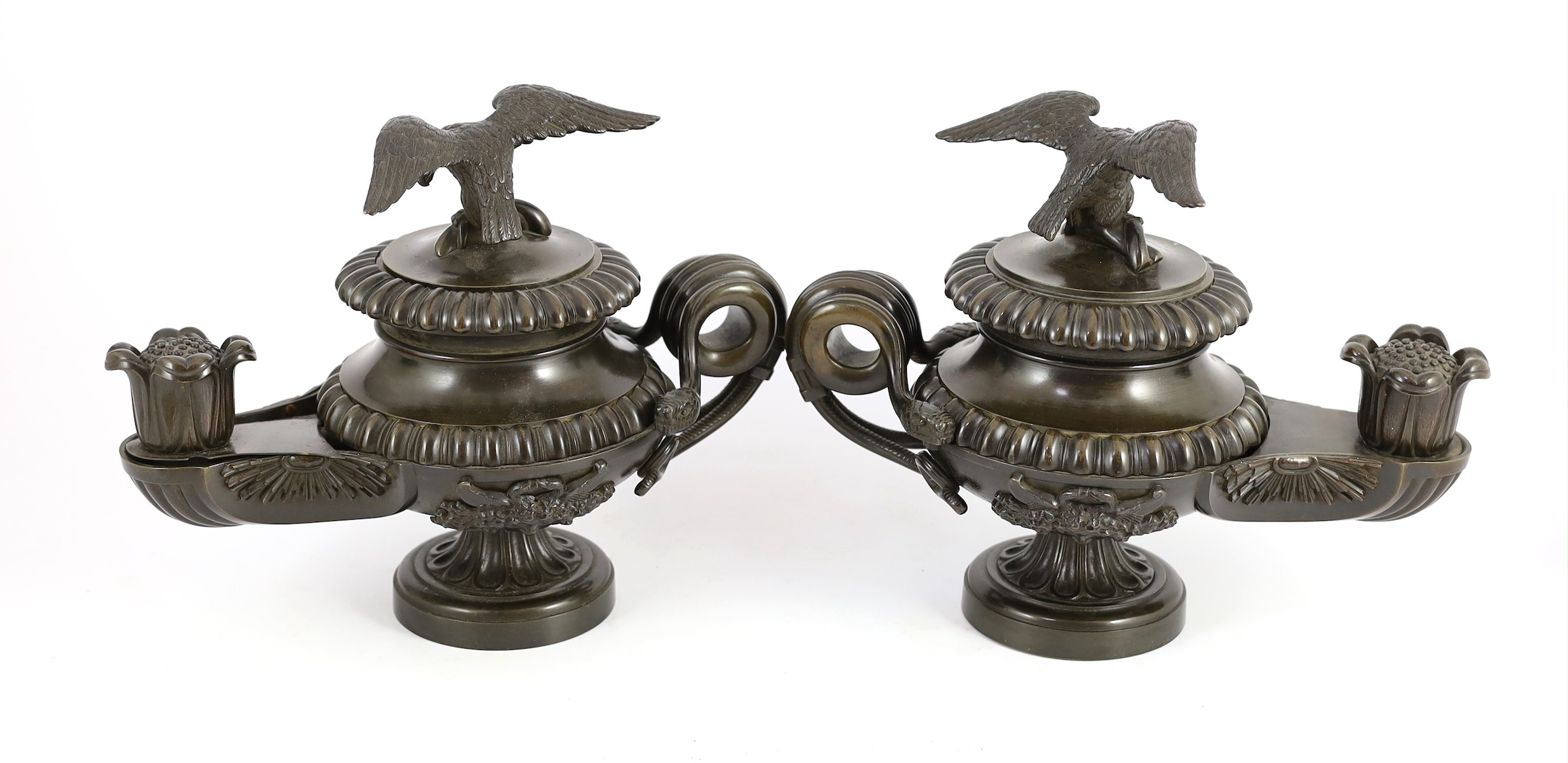 James De Ville, 367 Strand, London. A pair of Regency bronze oil lamps to a design by Thomas Hope, length 31cm depth 16cm height 25cm